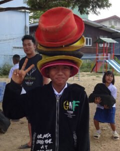 New_Society student hat balance